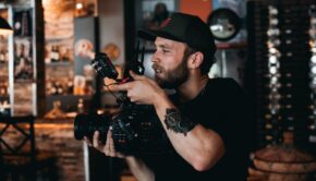 A Bearded Man Shooting a Film