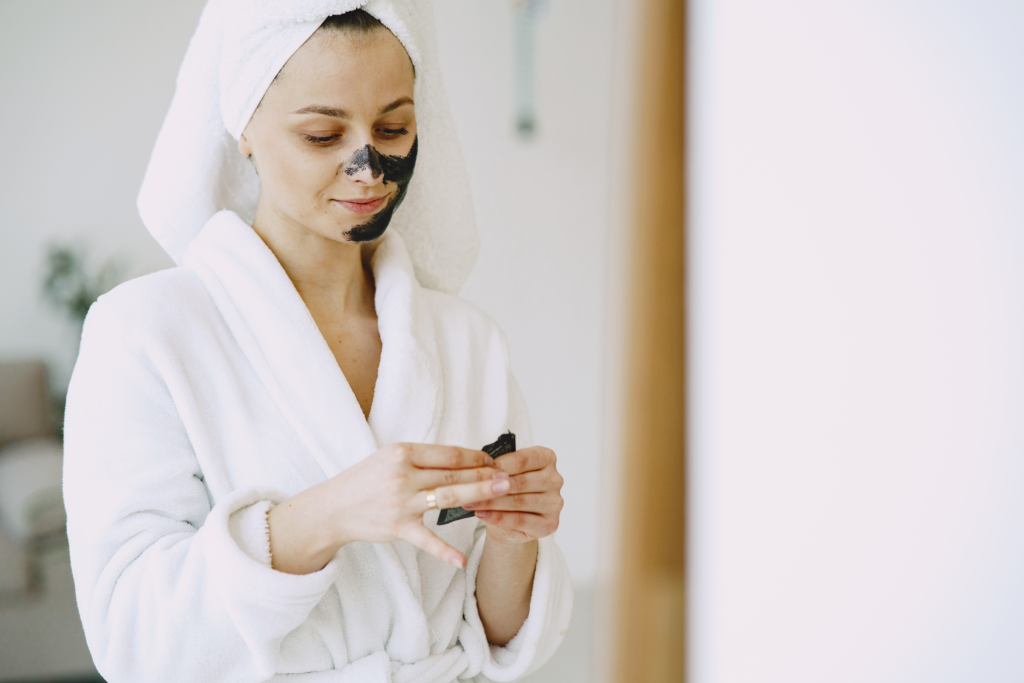 Woman with Towel Lying on Couch in Salon
