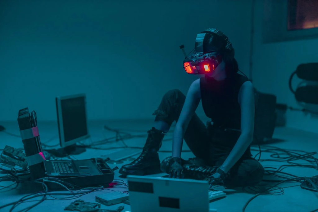 person sitting on the floor with vr glasses