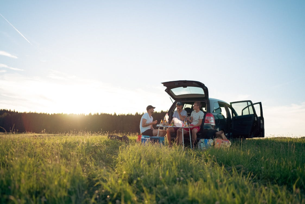 Three people doing camping picnic