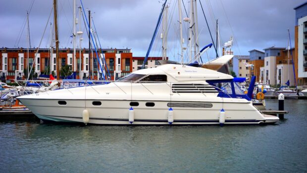 White Yacht Docked on Port