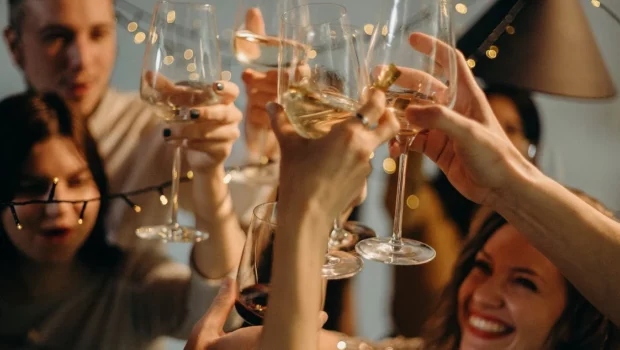 Selective Focus Photography of Several People Cheering Wine Glasses