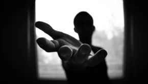 Man's Hand in Shallow Focus and Grayscale Photography