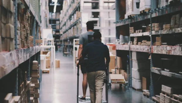 Men Going Around a Warehouse